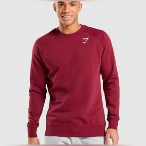 Gymshark Crest Sweatshirt in burgundy. 